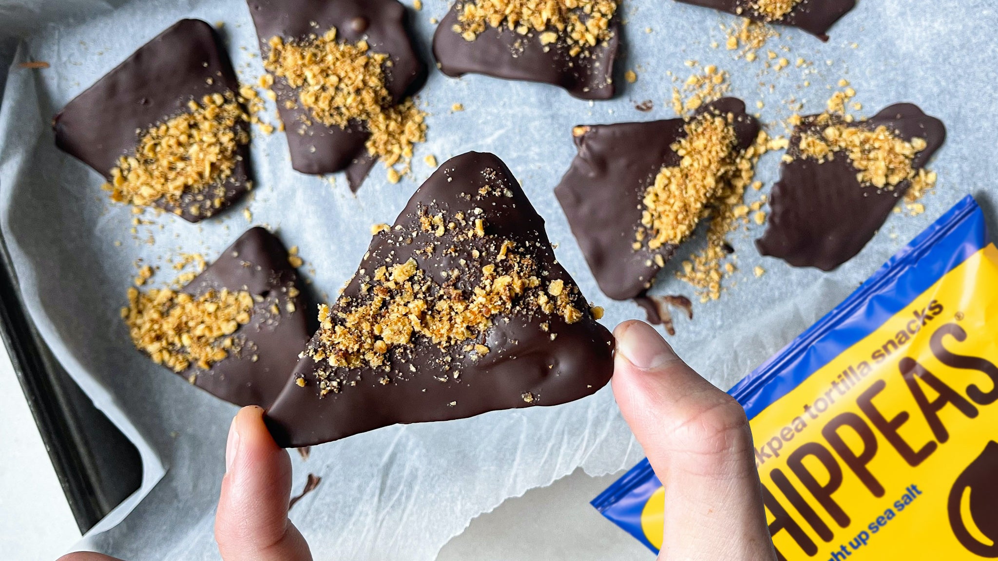 Chocolate covered Straight up Sea Salt Tortilla Chips with a cinnamon crumb